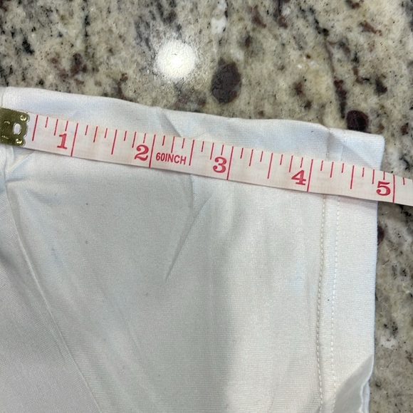 White cap sleeve tee with LV logo. No care tags. Feels like rayon/cotton blend. - Picture 8 of 11